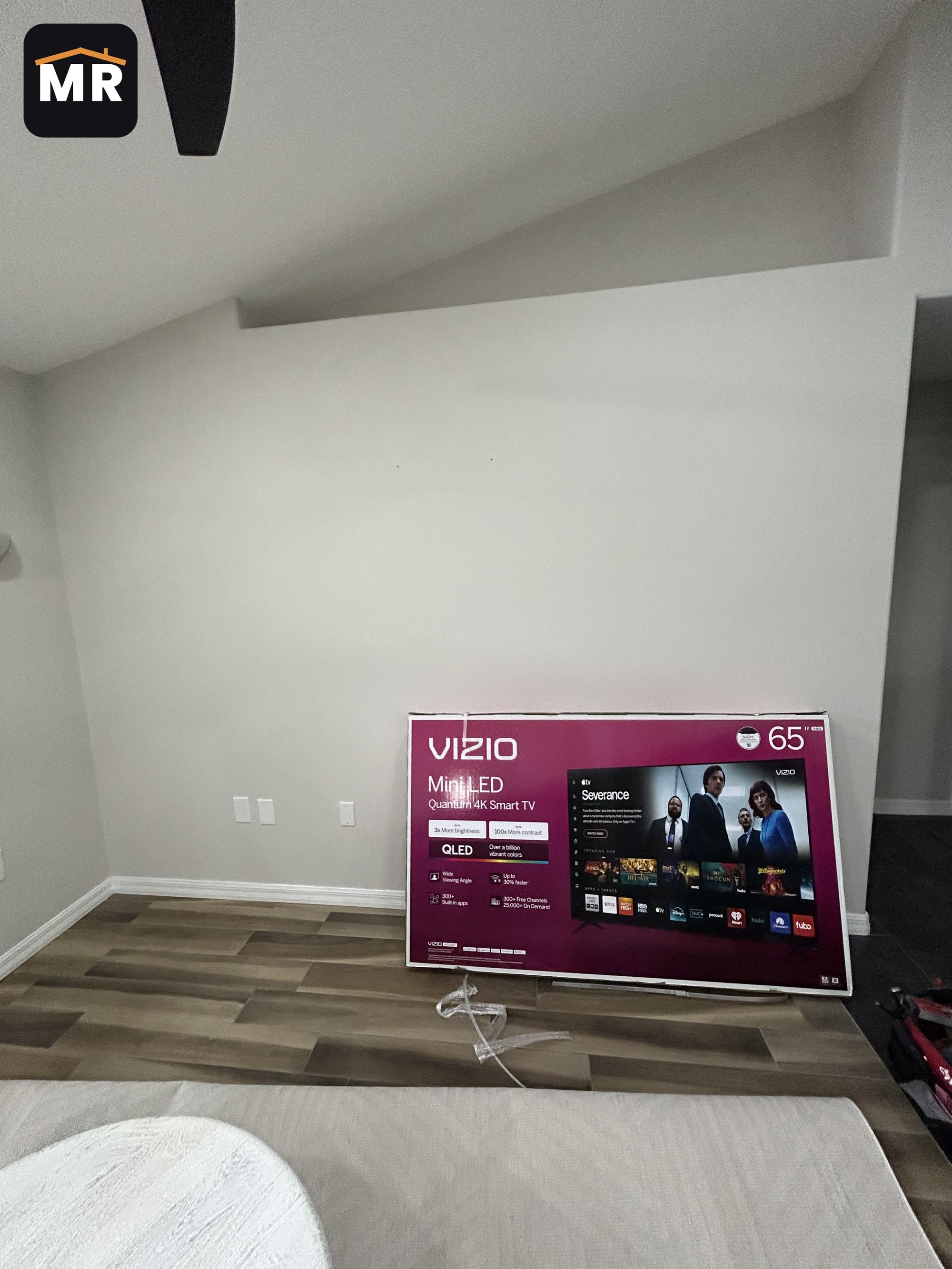 Venice TV mount before: bare living room wall before the 65 inch TV was installed